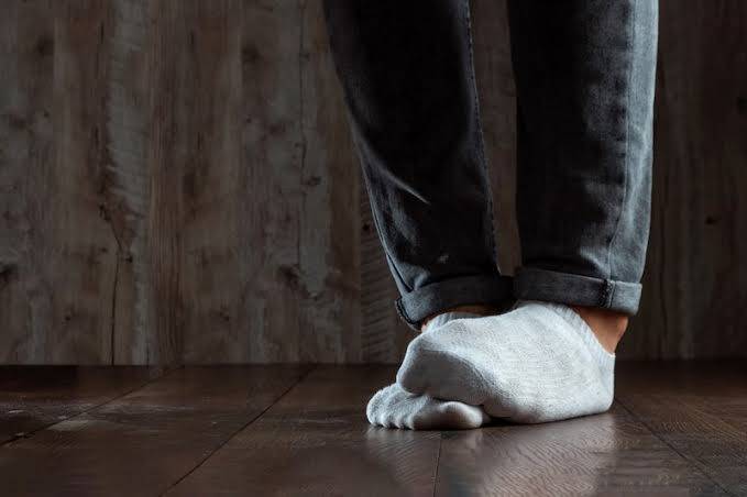Why do our feet smell after a long day?
