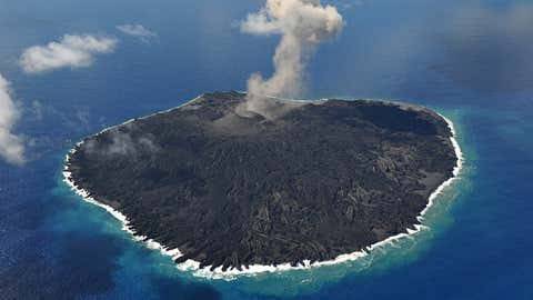 Why do volcanoes form islands?