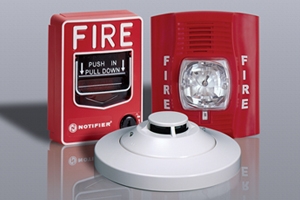 How do fire alarms detect smoke?